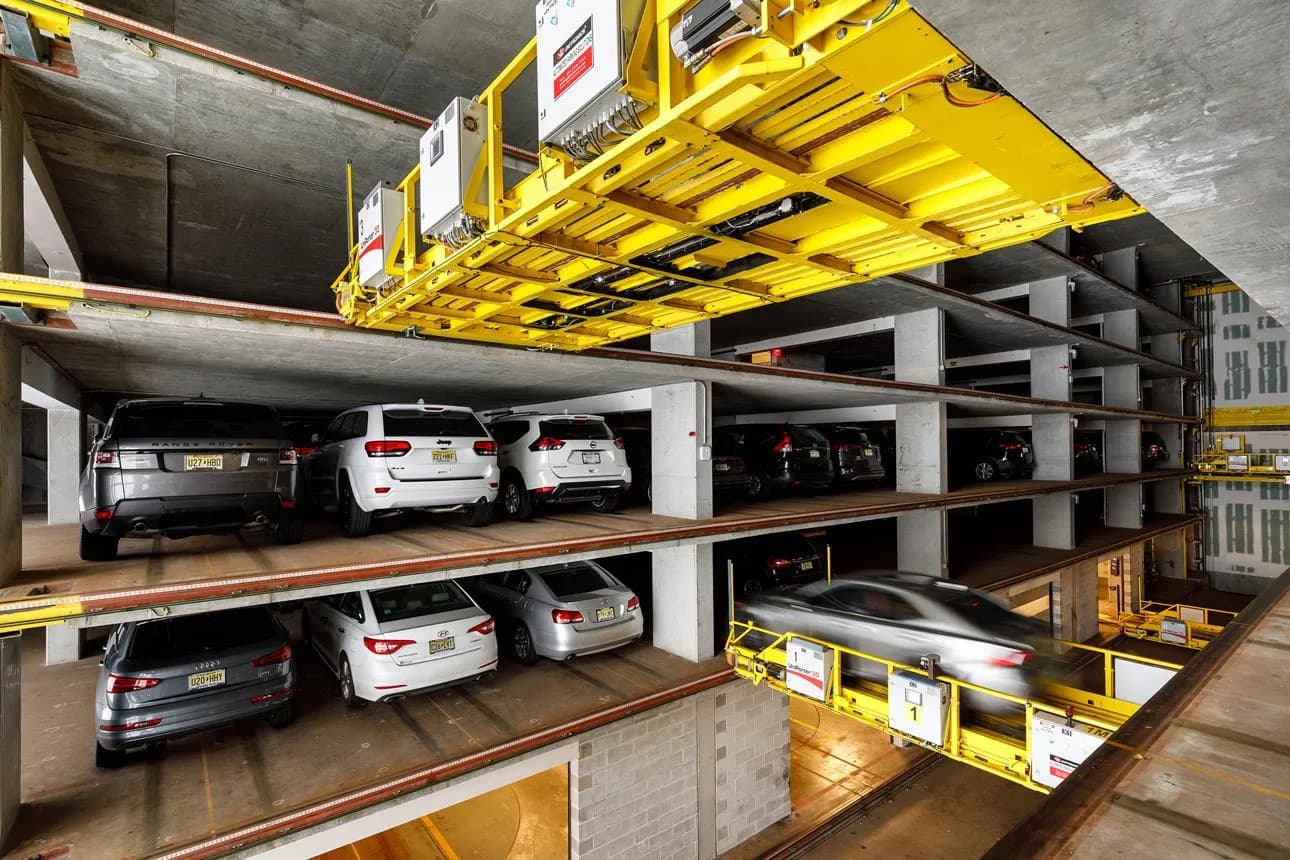 STACKX mechanical parking structure fully occupied in a real installation